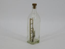 Folk man in bottle c. 1910