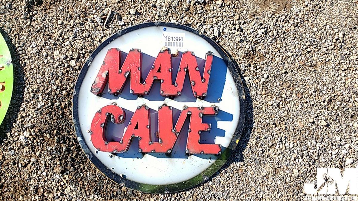 23" METAL MAN CAVE SIGN