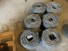 6 ROLLS OF BARBED WIRE