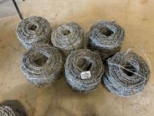 6 ROLLS OF BARBED WIRE