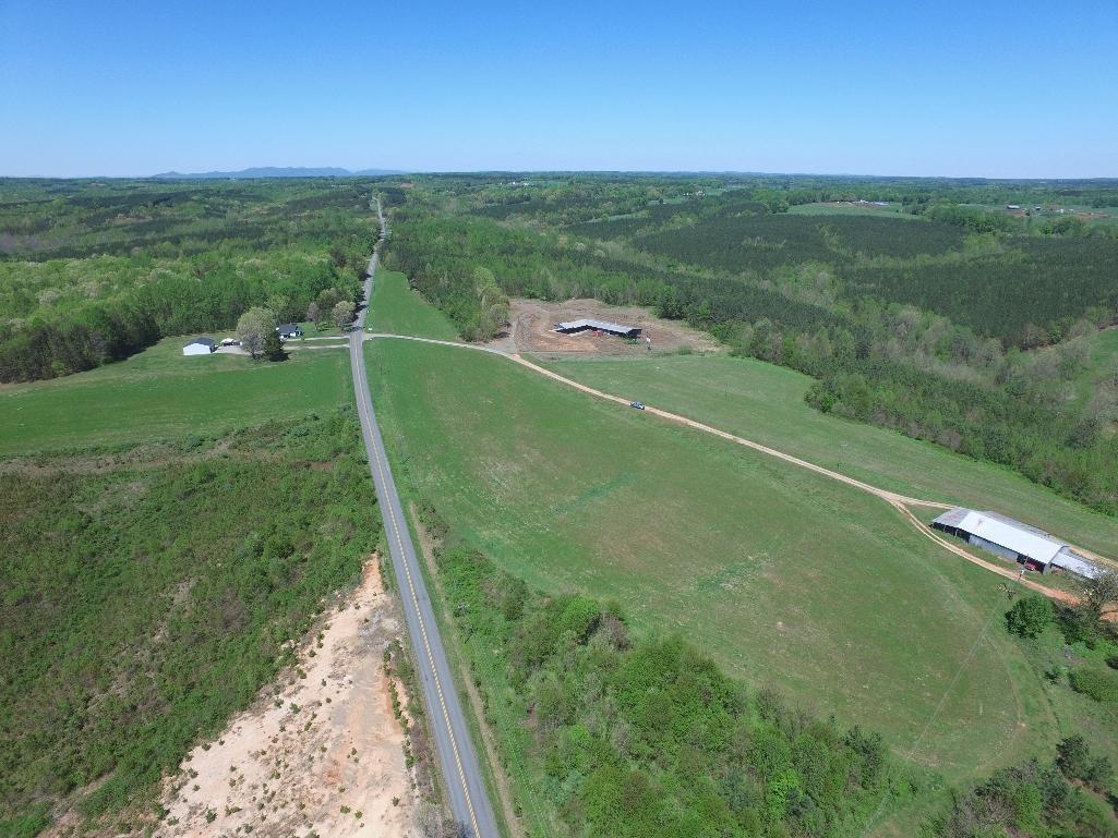 Real estate: 7.6 acres approximately with buildings