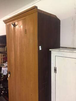 Antique cupboard with pine finish. Large cupboard with shelving and hooks