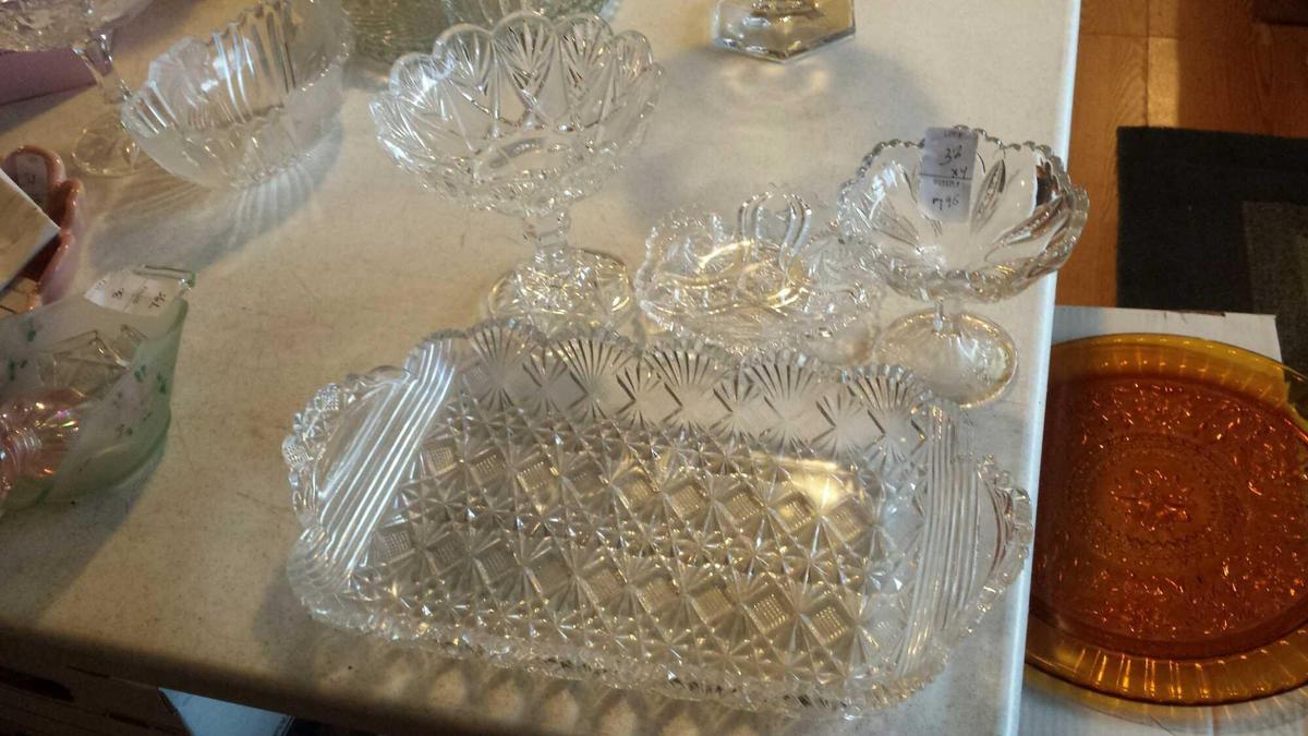 4 Exciting Glass Pieces. (2) compotes (1) small dish (1) serving tray with handles