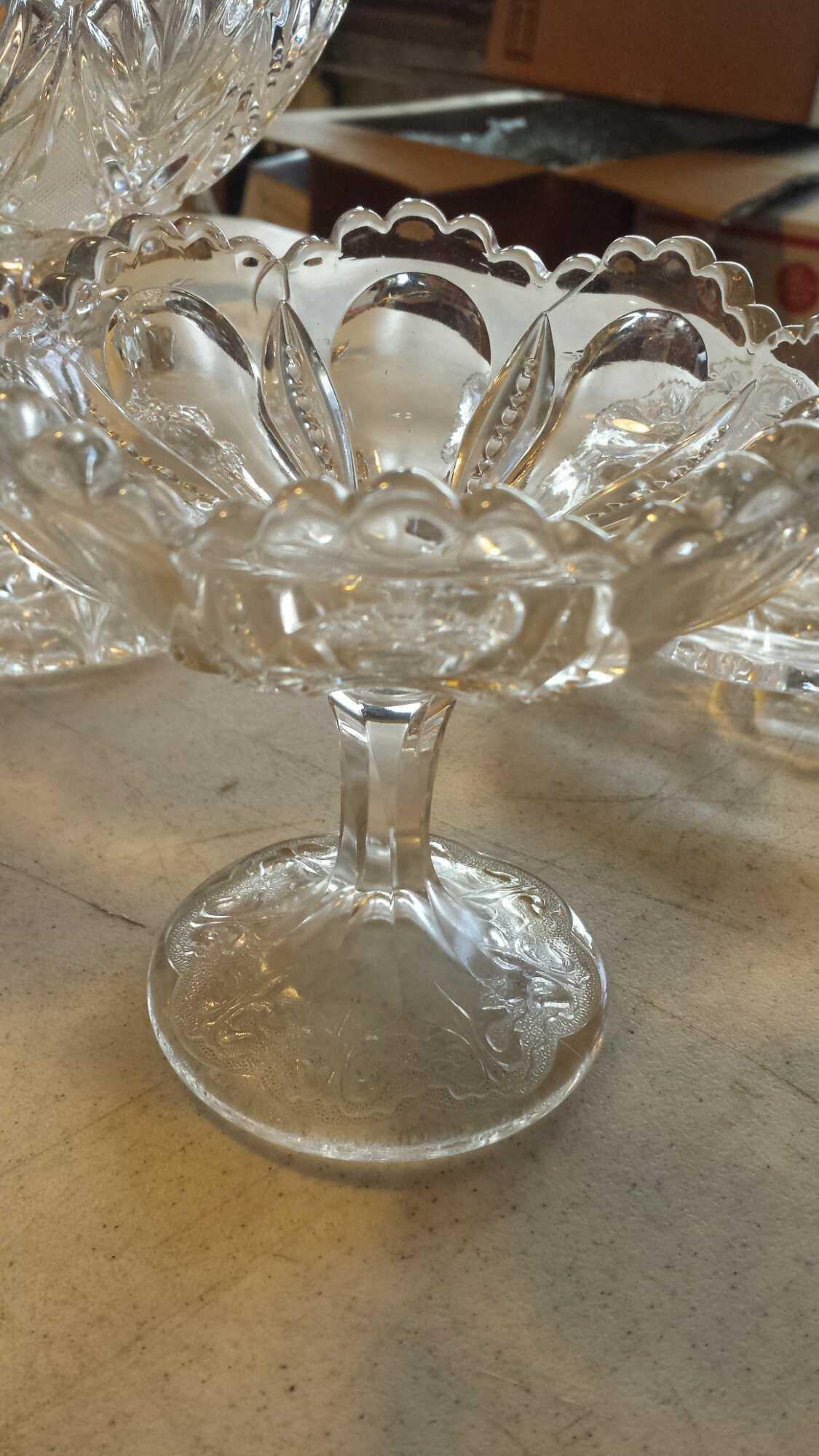 4 Exciting Glass Pieces. (2) compotes (1) small dish (1) serving tray with handles