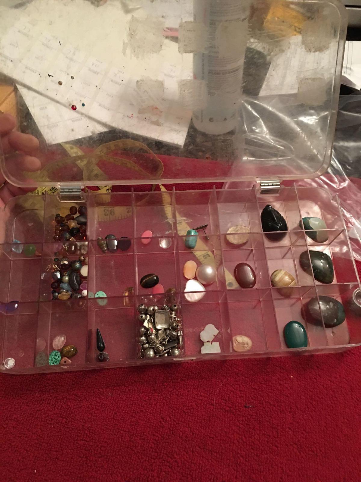 Divided plastic container with Stones and beads