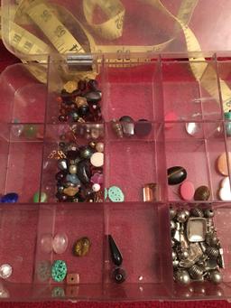 Divided plastic container with Stones and beads