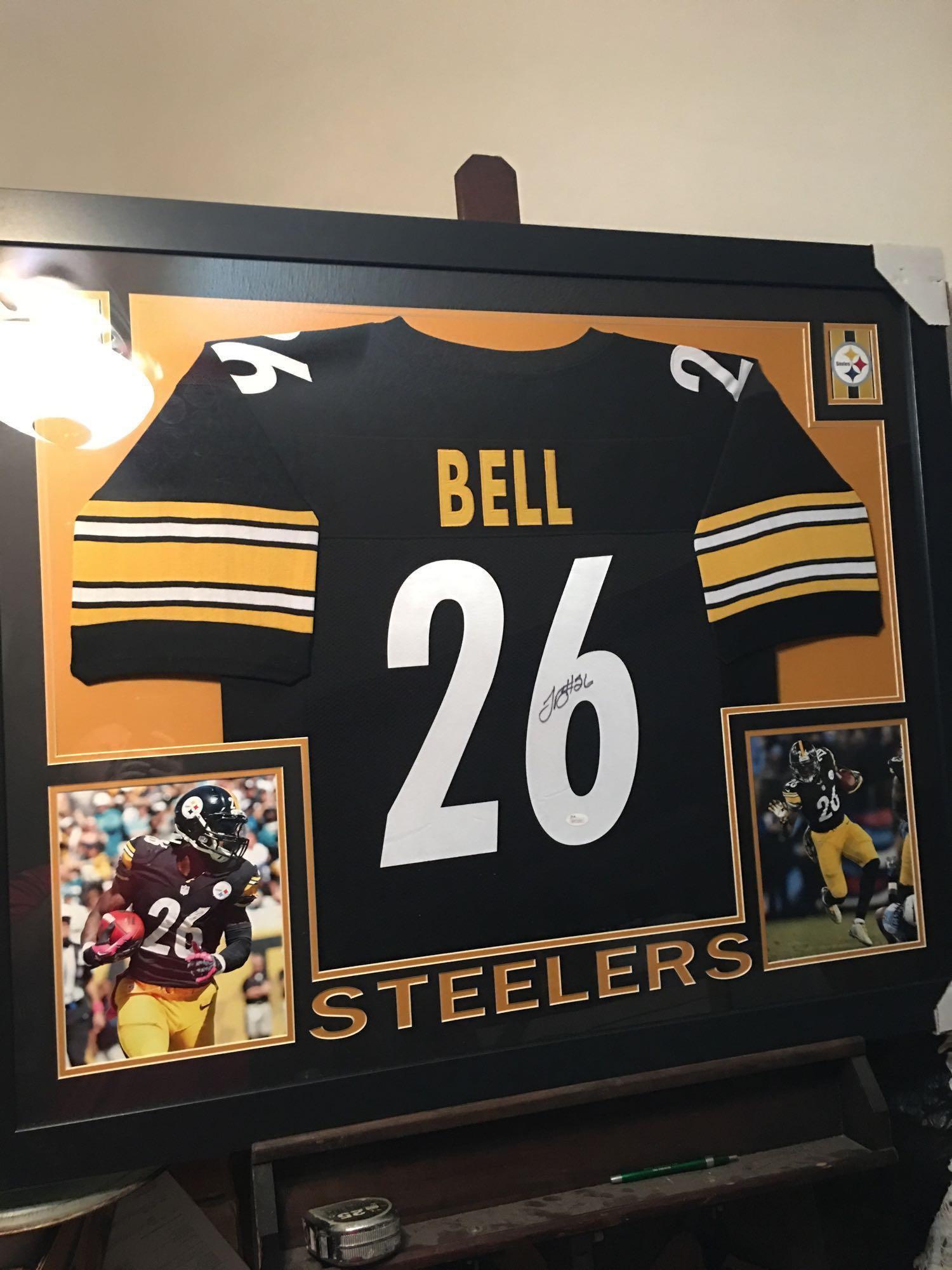 Fabulous authentic Signed Le?Veon Bell jersey framed and matted With photos