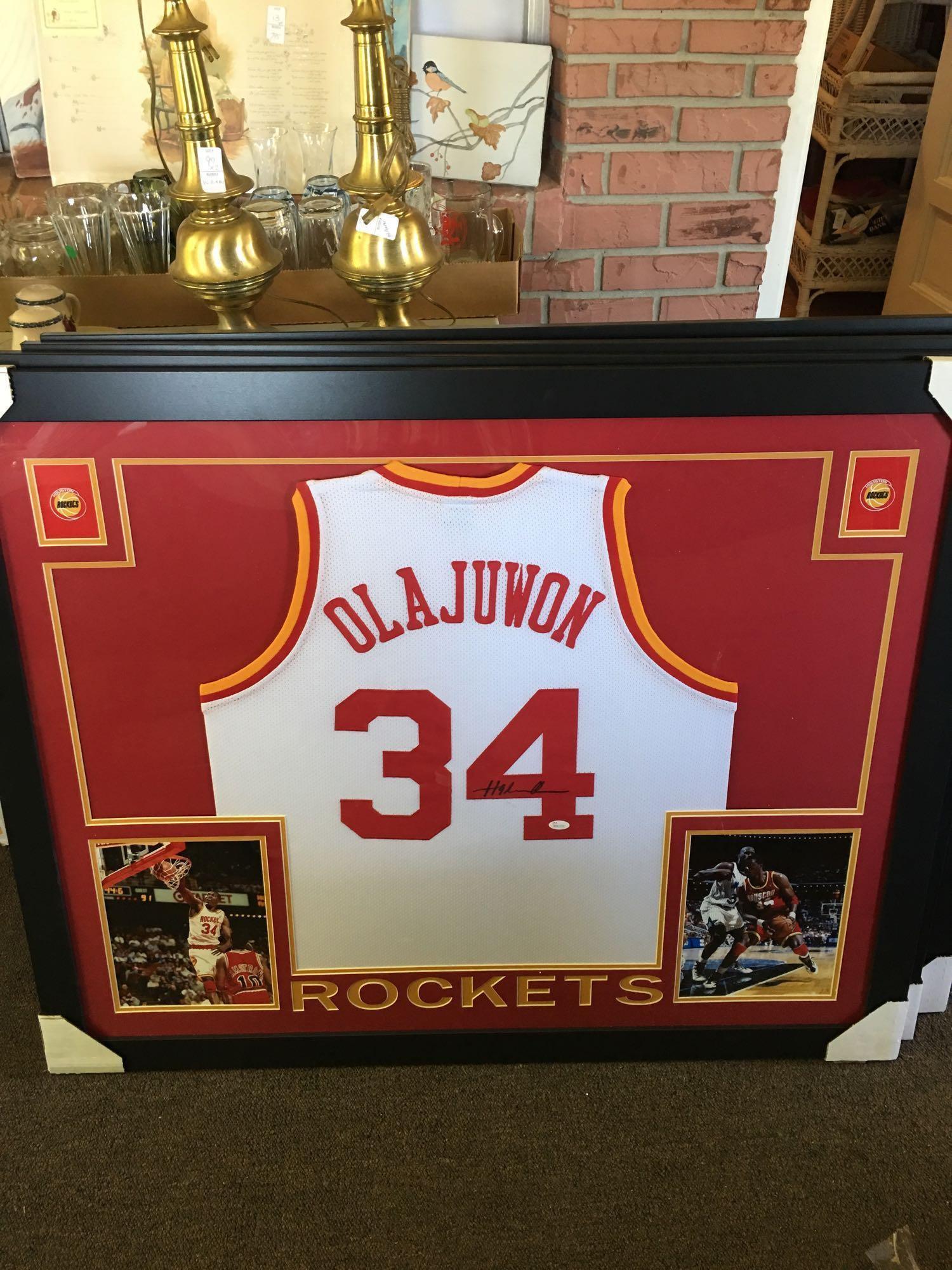 Wonderful authentic Signed Hakeem Olajuwon jersey framed and matted With photos