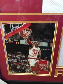 Wonderful authentic Signed Hakeem Olajuwon jersey framed and matted With photos