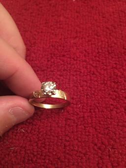 Gorgeous 14k Gold Solitaire Diamond ring with diamond accent band