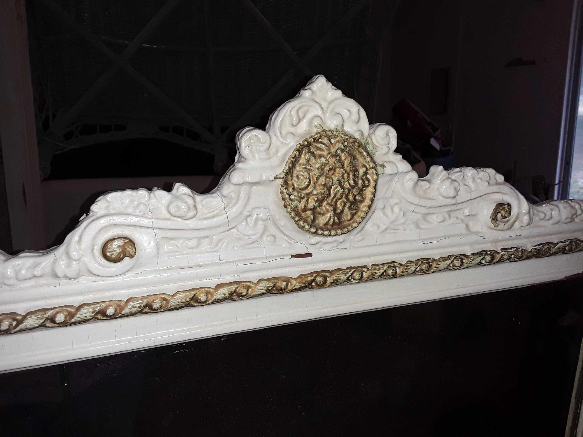 Wide shabby chic antique wall mirror with golden ornamentation