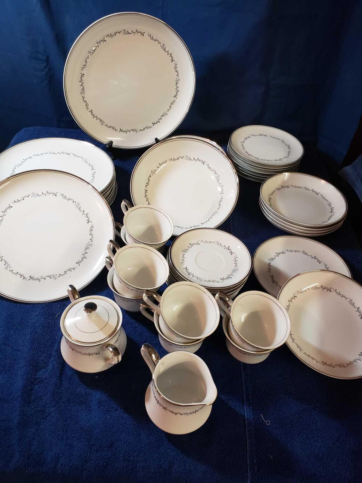 45 Piece Express China from Japan with blue & grey designs with silver trim