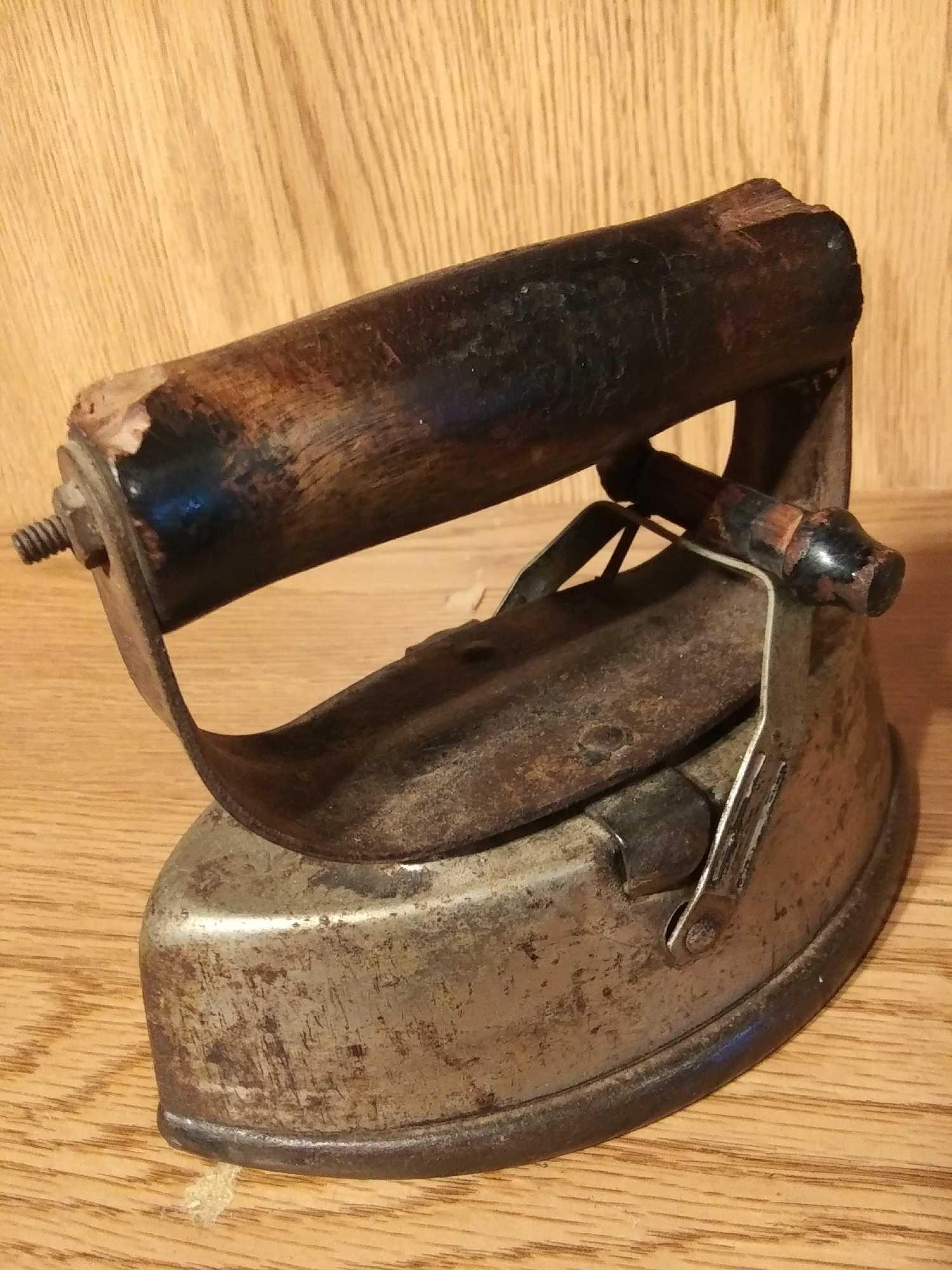 VERY OLD ASBESTOS LOCKING SAD IRON WITH WOODEN HANDLES