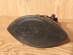 VERY OLD ASBESTOS LOCKING SAD IRON WITH WOODEN HANDLES