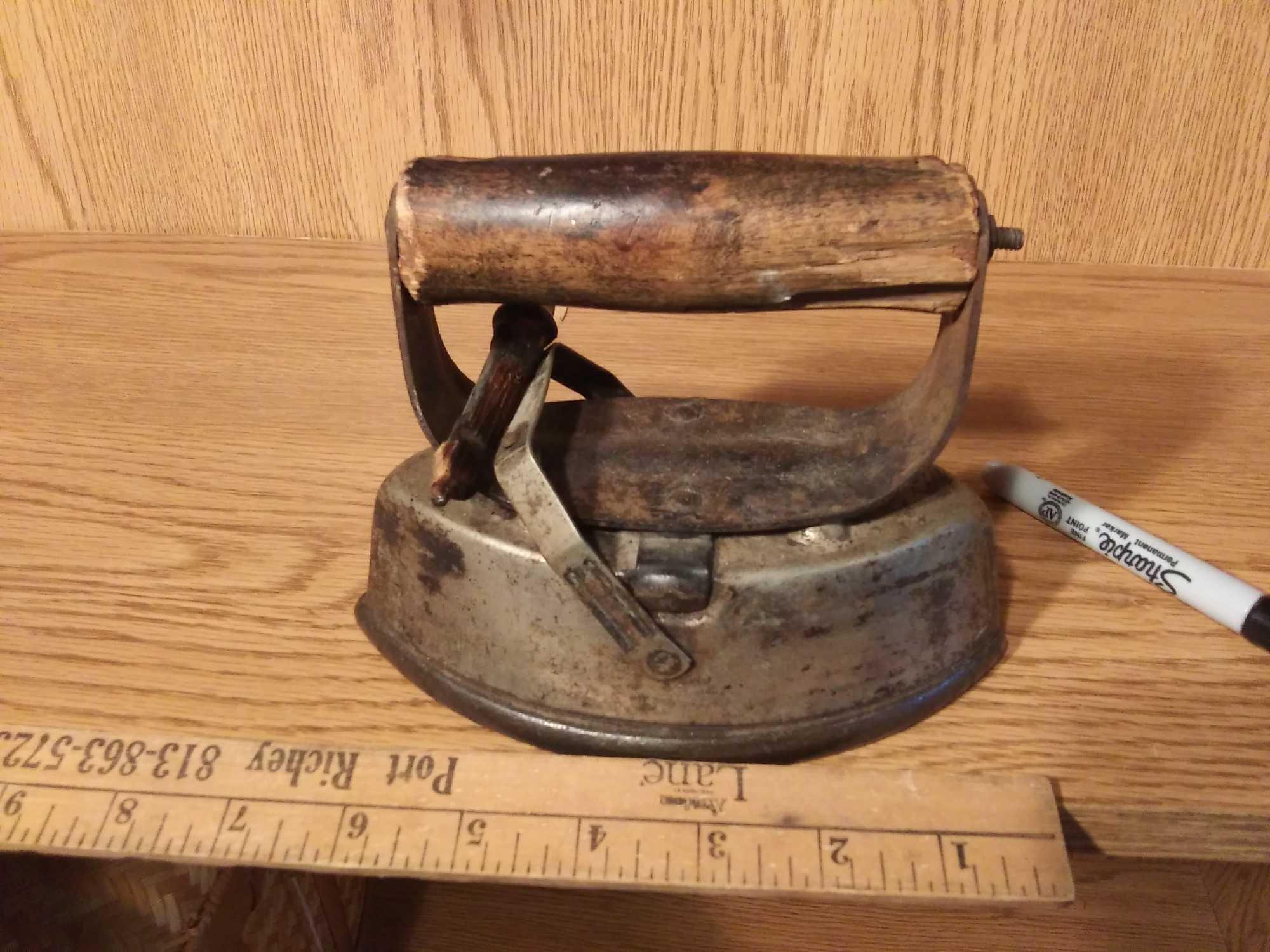 VERY OLD ASBESTOS LOCKING SAD IRON WITH WOODEN HANDLES