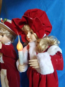 2 Ft. Tall holiday boy and girl animatronic and lighted Christmas carolers