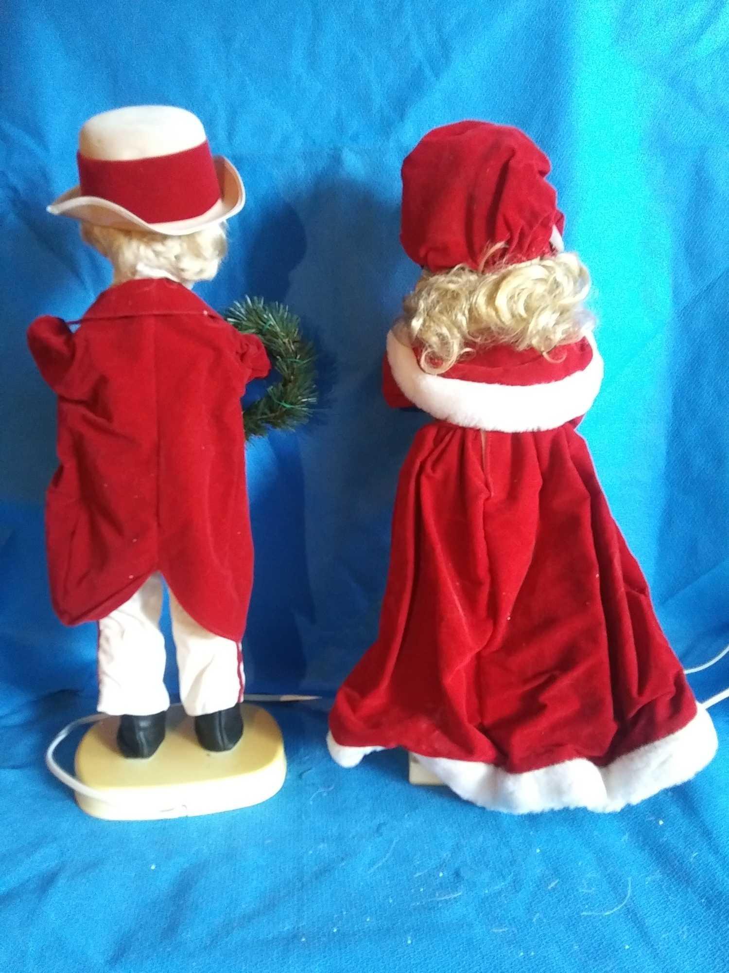 2 Ft. Tall holiday boy and girl animatronic and lighted Christmas carolers