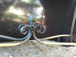 metal and braided rope entryway table with pineapple finial accent