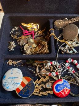 Jewelry box with contents including lots of Elvis related jewelry