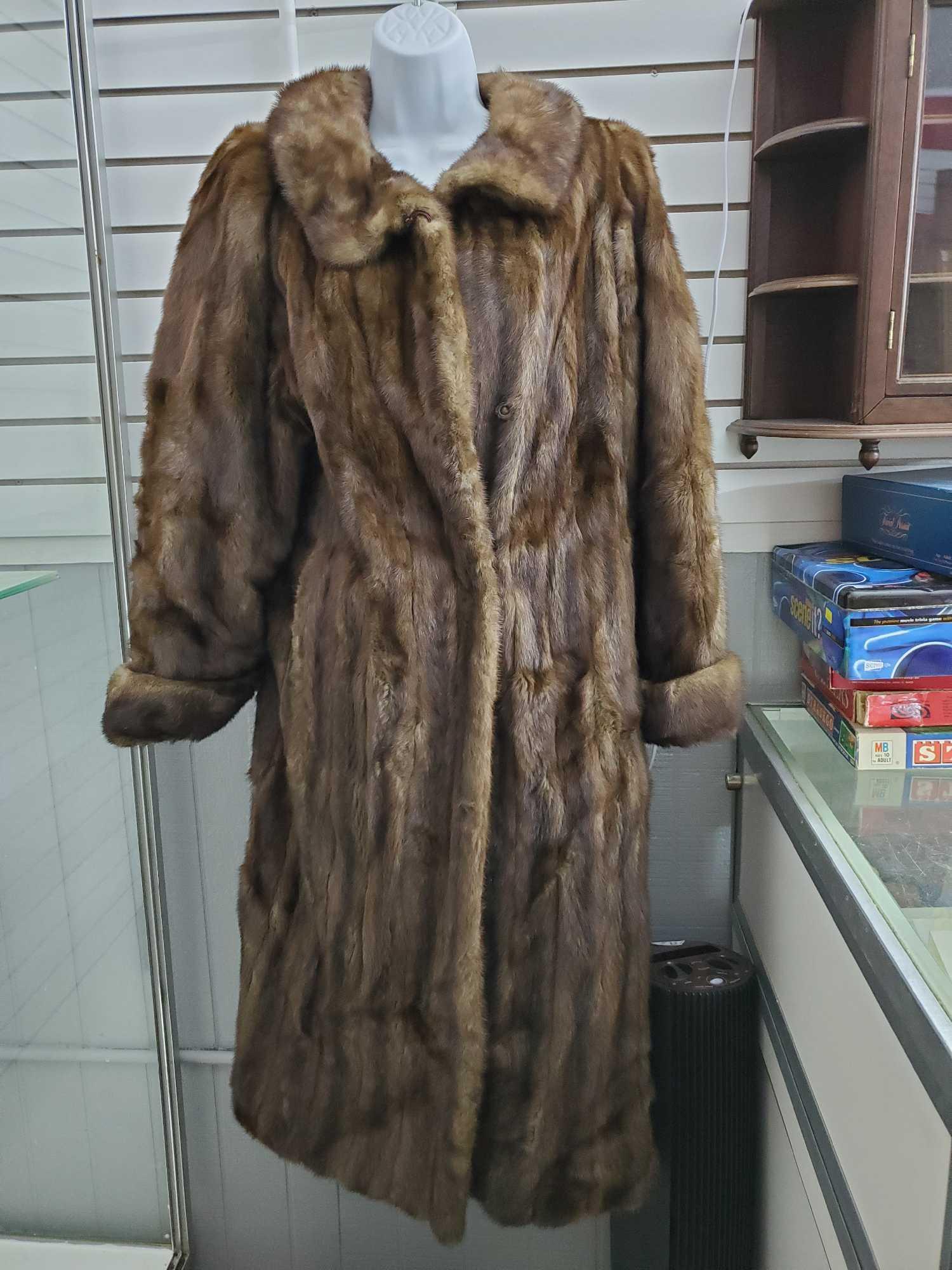 Well constructed Simes Gigos FUR COAT, long length, lined, with pockets