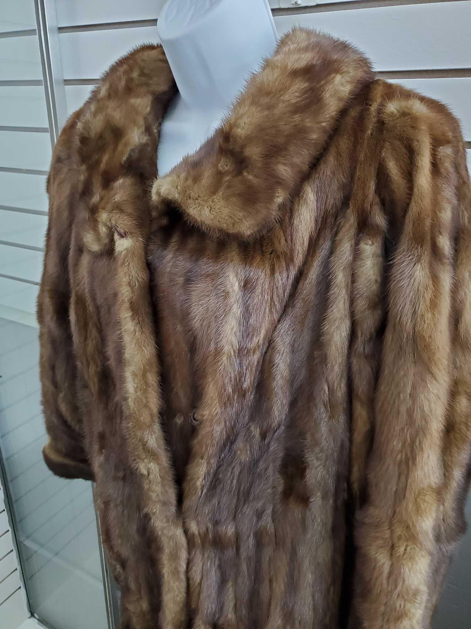 Well constructed Simes Gigos FUR COAT, long length, lined, with pockets