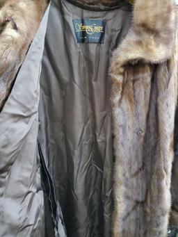 Well constructed Simes Gigos FUR COAT, long length, lined, with pockets