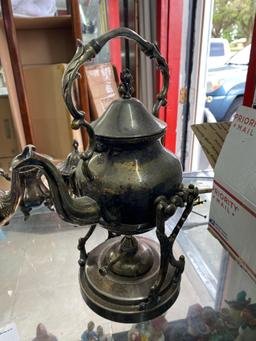 Rare silver on copper tilting tea pot on stand