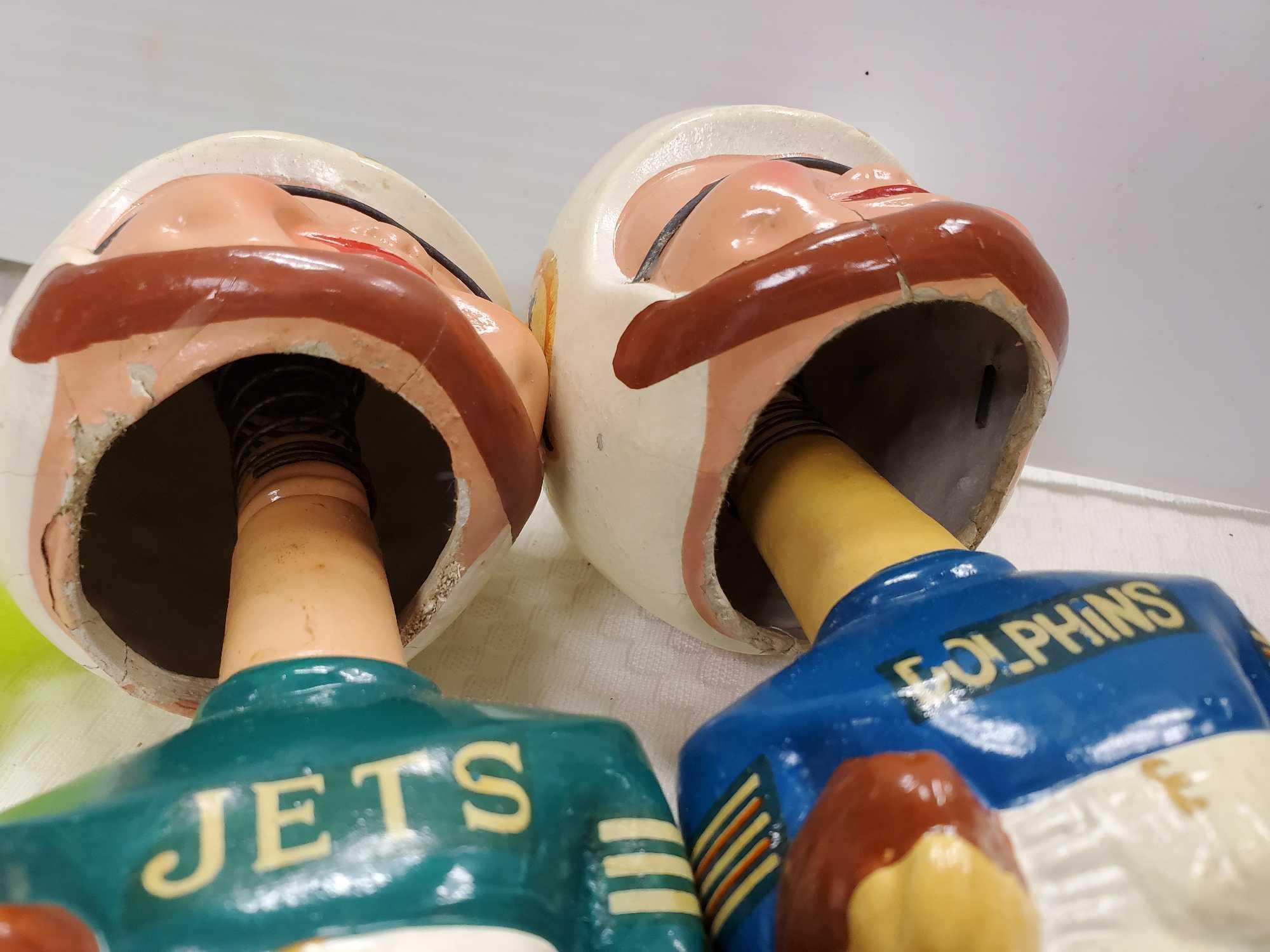 PAIR OF VINTAGE SPORTS SPECIALTIES NEW YORK JETS AND MIAMI DOLPHINS BOBBLEHEADS