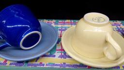 (8) PC FIESTA MUGS AND SAUCERS MULTI COLORED,.BLUE YELLOW TAN