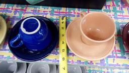 (8) PC FIESTA MUGS AND SAUCERS MULTI COLORED YELLOW BLUE PINK MAROON