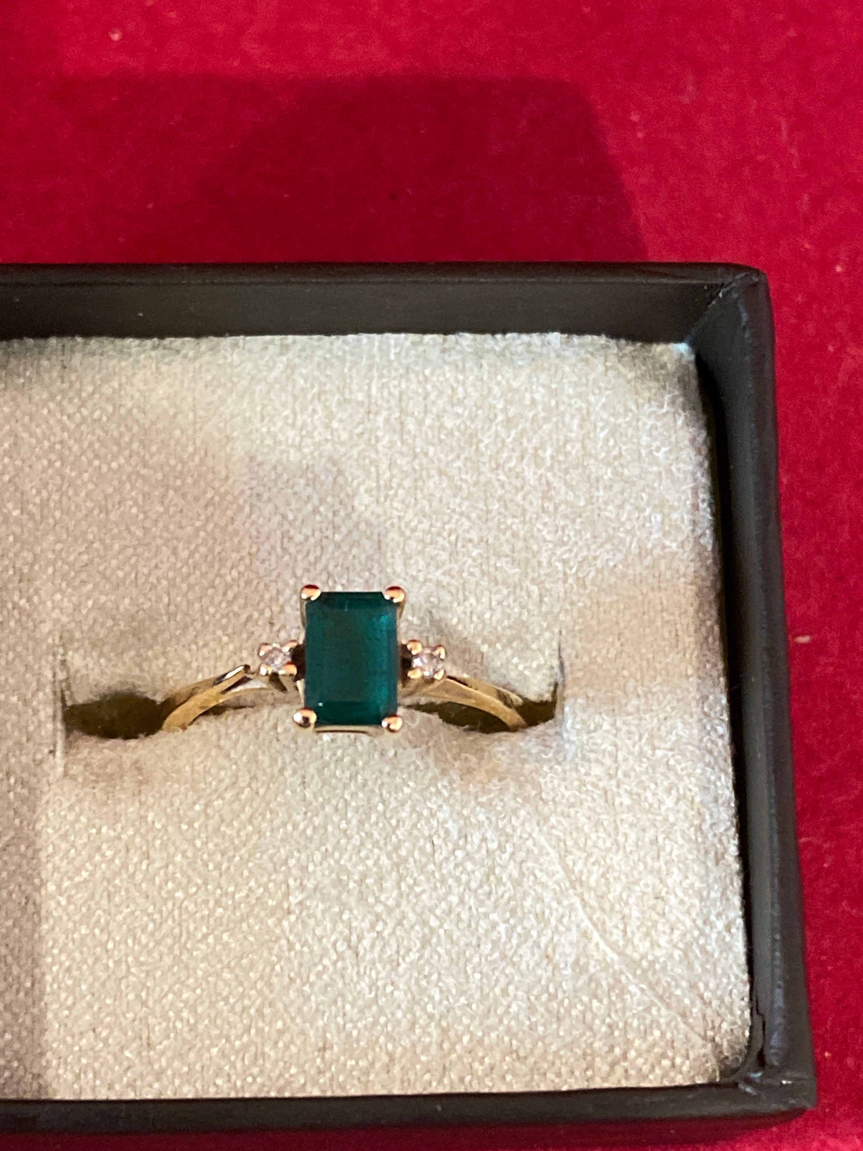 14k gold Emerald and diamond ring