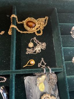 Contents of wooden jewelry chest