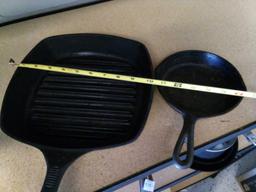 PAIR OF CAST IRON INCLUDING EMERIL AND 4D SIZE 3