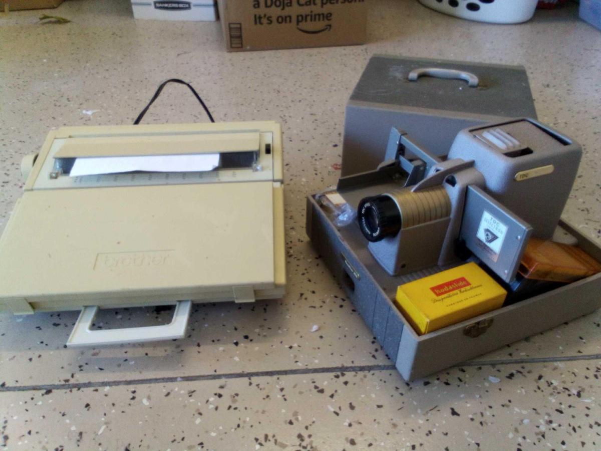 PAIR OF VINTAGE TECHNOLOGY, PROJECTOR AND WORD PROCESSOR