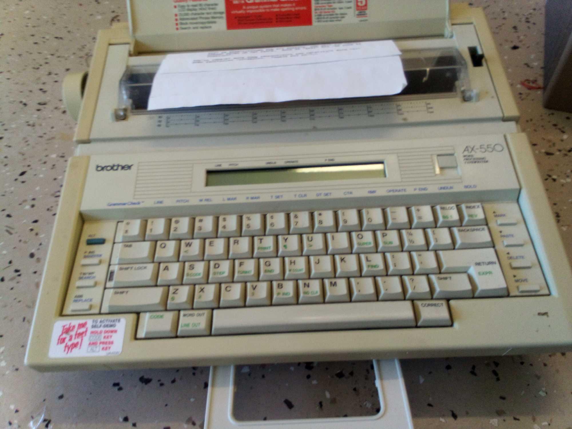 PAIR OF VINTAGE TECHNOLOGY, PROJECTOR AND WORD PROCESSOR