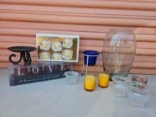 Candle decor including new in box With tall smoke glass vase