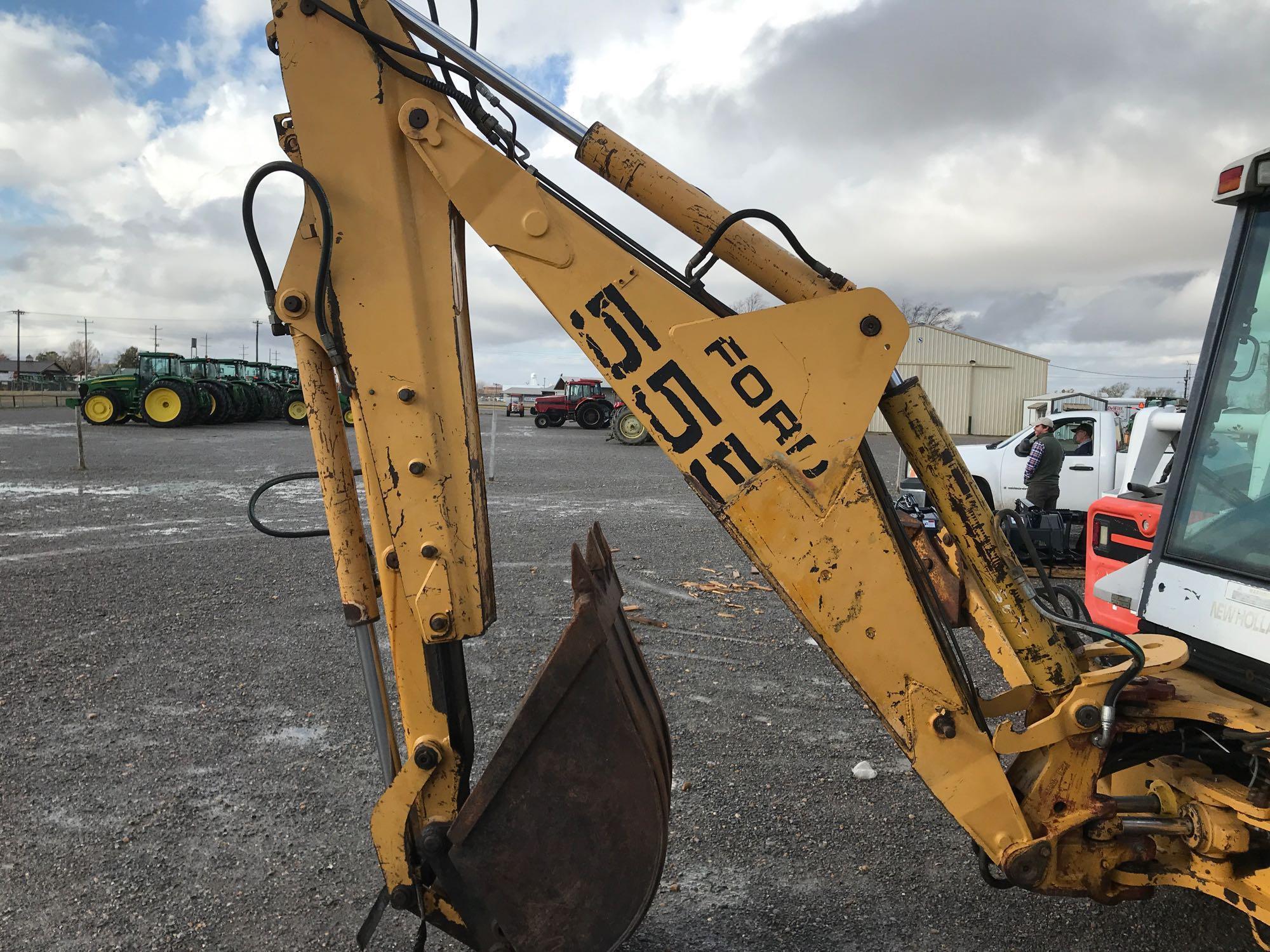 New Holland 555E