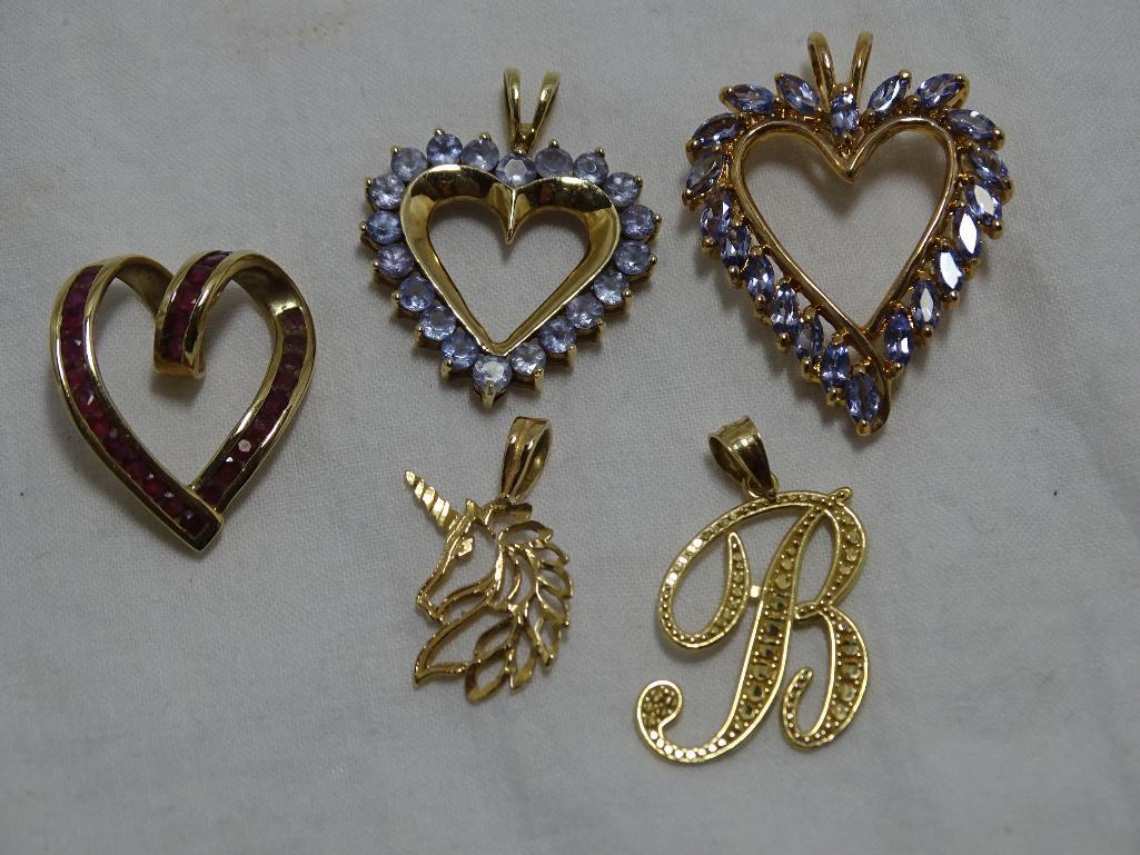 Five Gold Pendants