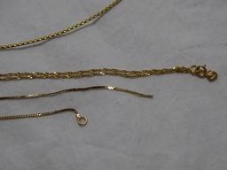 Four Gold Necklaces