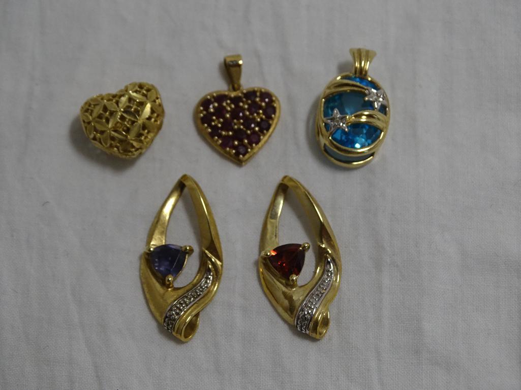 Five Gold Pendants