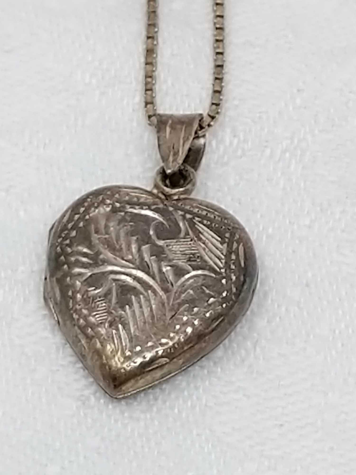 Carved Jewelry & Sterling Locket
