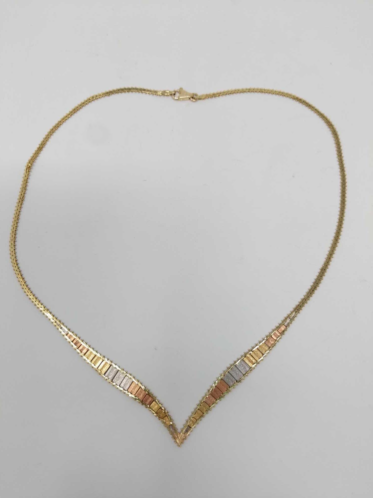 Two Gold Necklaces and Pendant