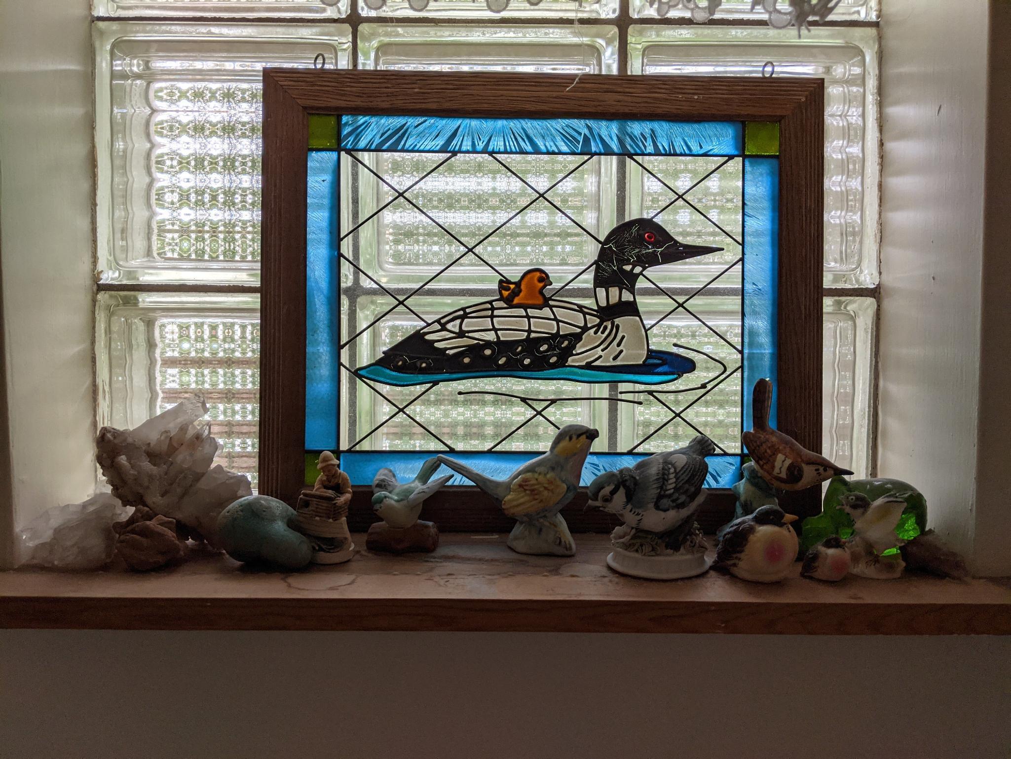 Framed Plastic Stained "Glass" Window with Loon and Figures Grouping