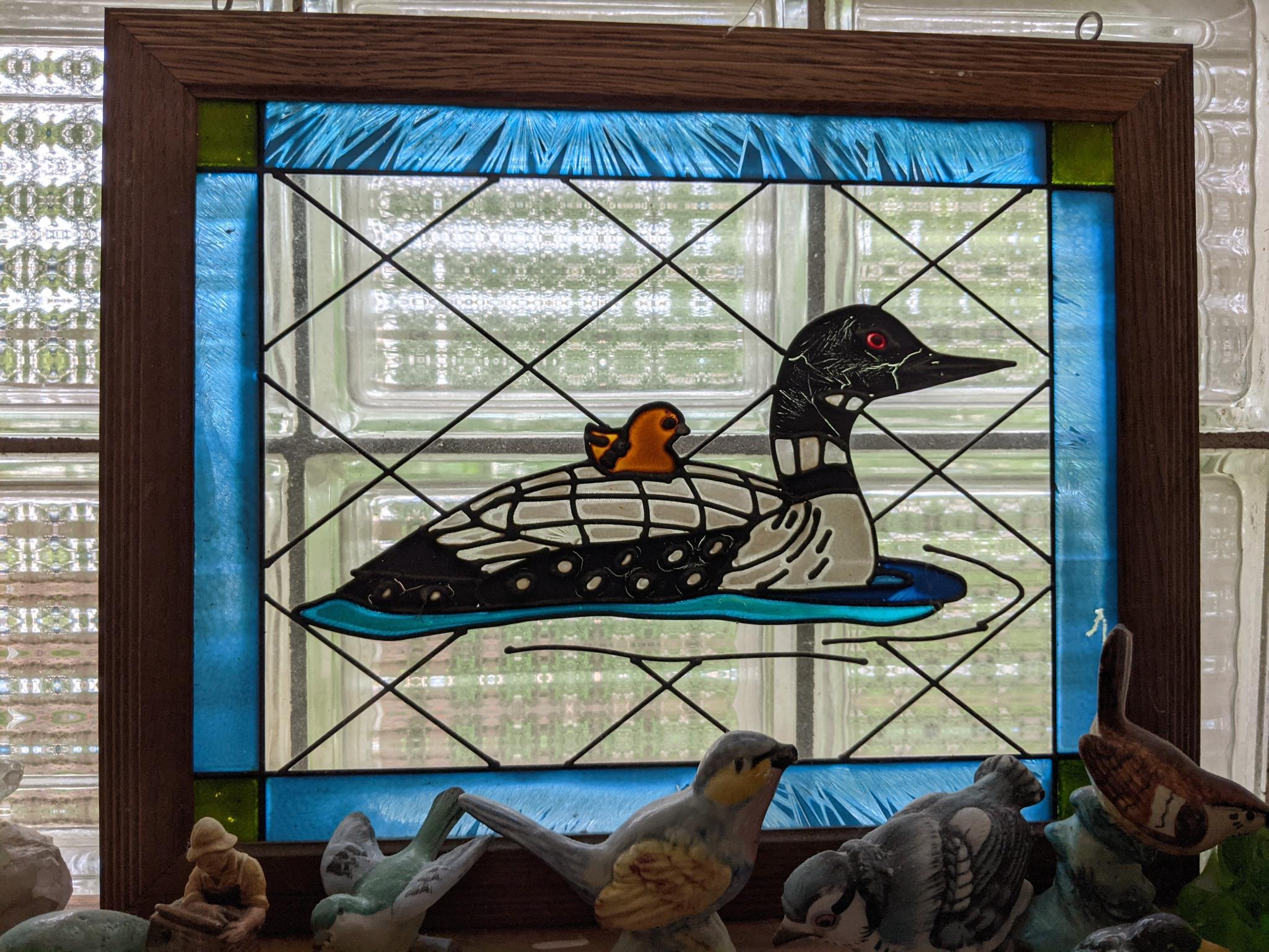 Framed Plastic Stained "Glass" Window with Loon and Figures Grouping