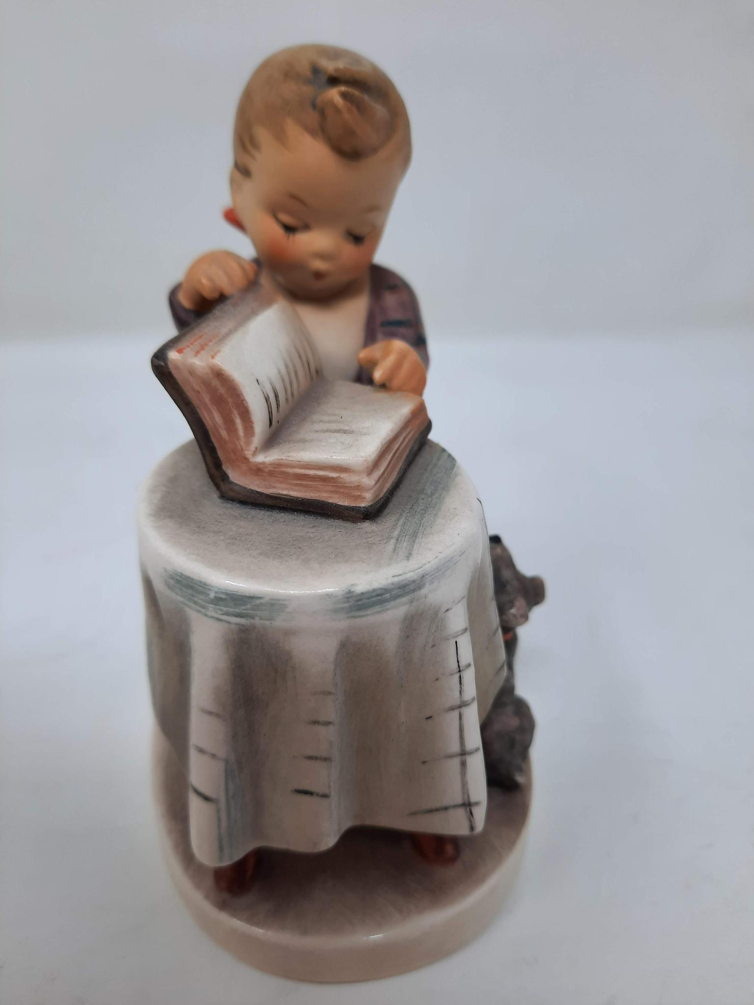 3 Hummels - Doll Bath, 319; Girl Praying with Baby Carriage, 67; Boy Reading Book by Table, 206