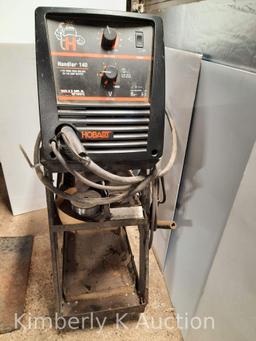 Hobart Welder "Handler 140", 110 Volt, Wire Feed Welder with Rolling Cart and Bottle