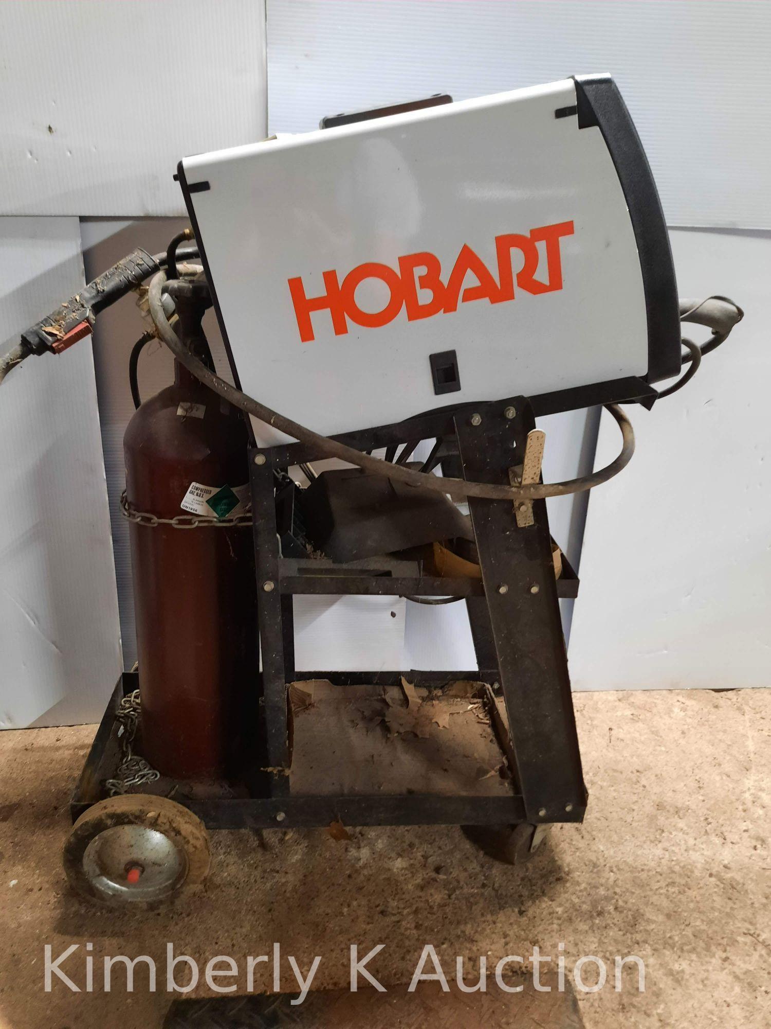 Hobart Welder "Handler 140", 110 Volt, Wire Feed Welder with Rolling Cart and Bottle