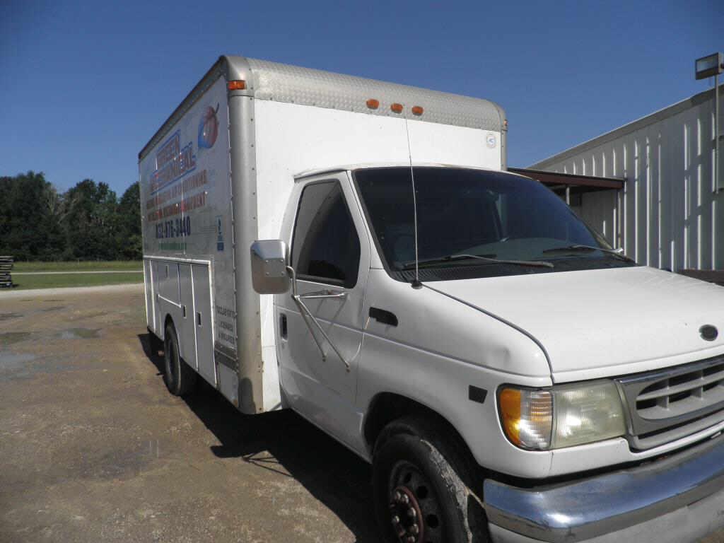 2002 Ford Van (27000.miles on new motor in 2017)