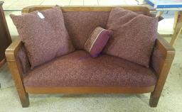 Antique Wood Accented Loveseat
