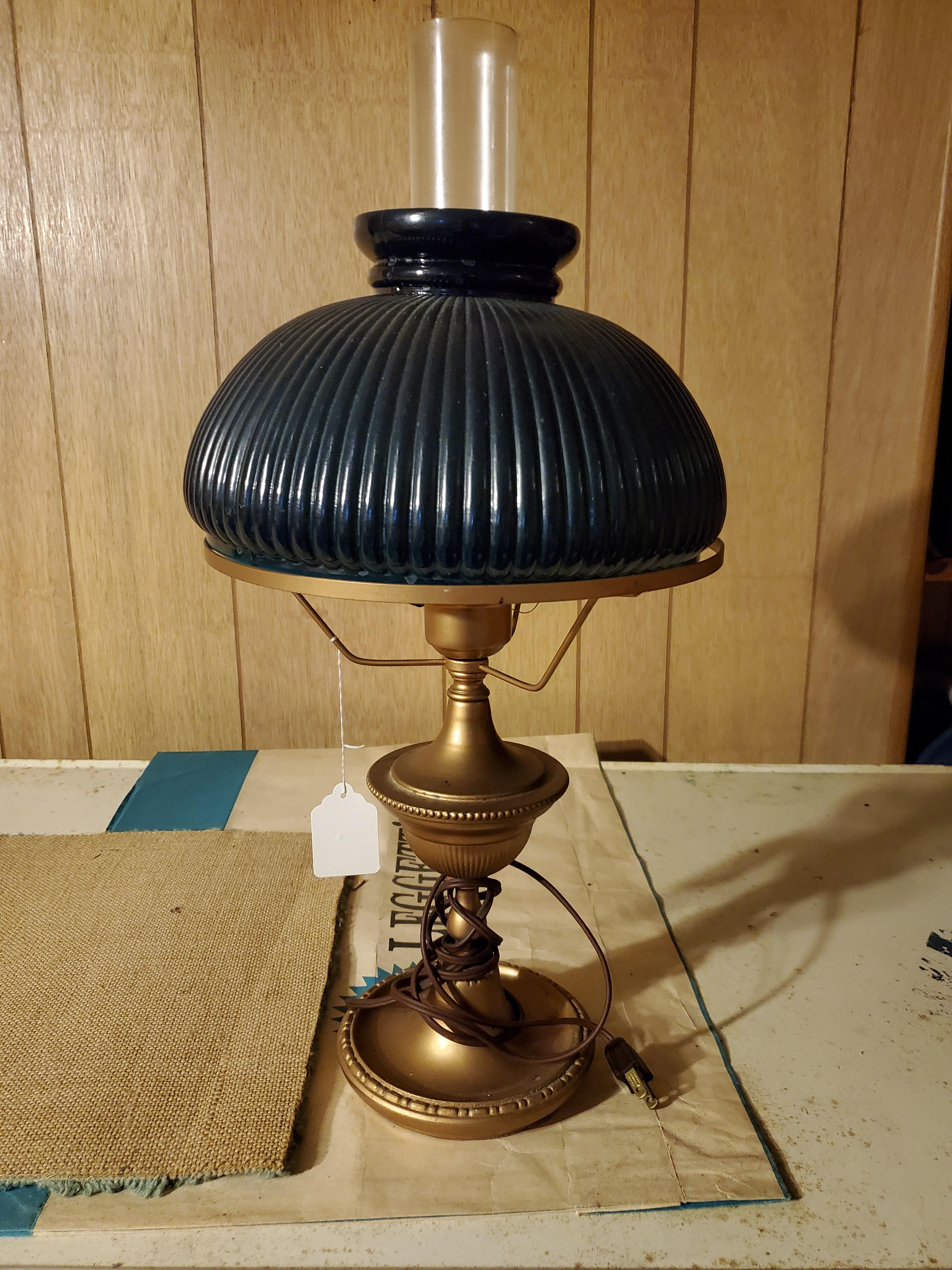 brass lamp with blue shade